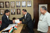 Click to enlarge Members of the Garo Baptist Convention, Tura handing over the cheque towards the Chief Minister's relief fund to Meghalaya Chief Minister, Dr. Mukul Sangma