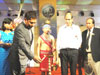 Dr Mukul Sangma lighting the lamp to mark the inauguration of the Golden Jubilee Celebration of Sankardev College Shillong