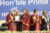 India Prime Minister, Dr. Manmohan Singh handing over the Life Time Achievement Award to Prof. Pramod Tandon, Vice-Chancellor, NEHU at the 96th India Science Congress