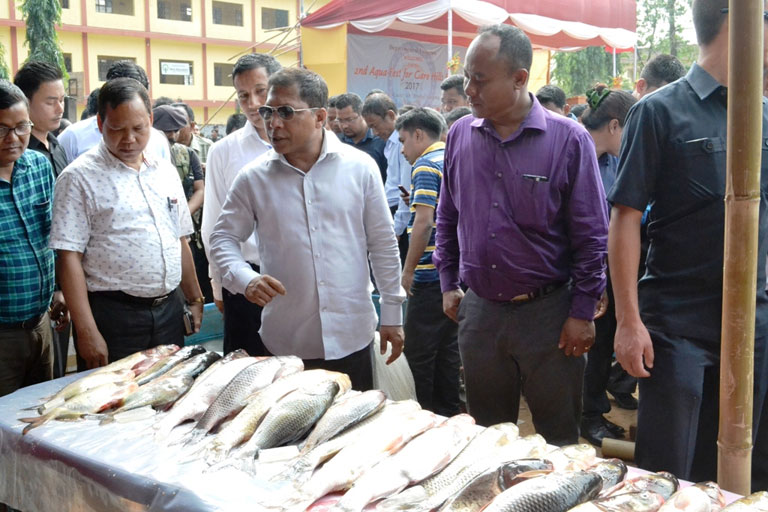 Click to enlarge Chief Minister Dr Mukul Sangma visits stalls during the Aquafest 2017 for Garo Hills region at Tura