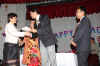 Click to enlarge Meghalaya Education Minister, Mr. M Chaudhuri giving away the award to one of the awardee on the occasion of the Teachers' Day celebration at Soso Tham Auditorium