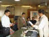 Meghalaya Chief Minister, Dr Donkupar Roy (right) administering the oath of office as Parliamentary Secretary to Mr Ishmial R Marak (left) in his office chamber