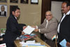 Click to enlarge Senior Vice President of Lafarge India, Mr Malik handing over a cheque of Rs 15 lacs to the Meghalaya CM, Dr Mukul Sangma in contribution towards the CM Fund