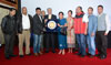 Meghalaya Governor Dr K K Paul felicitating Mr. Pradip Kurbah and his team for his award winning film 'Ri'