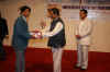 Click to enlarge Meghalaya CM, Dr Donkupar Roy presenting the Meghalaya IT Award to one of the meritorious students at the Award ceremony
