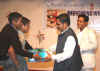 Click to enlarge Meghalaya CM, Dr Donkupar Roy presenting the Meghalaya IT Award to Mr Gregory Pyngrope one of the physically challenged students at the Award ceremony