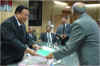Click to enlarge Justice D N Chowdhury submitting the Commission of Inquiry Report into the Police firing incident at Tura to the Meghalaya Chief Minister, Dr D D Lapang in his office chamber