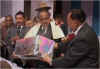 Click to enlarge Meghalaya CM, Dr D D Lapang presenting a gift to the Meghalaya Governor, Mr M M Jacob at the farewell meeting held in his honour organised by the State Government at the State Central Library Auditorium