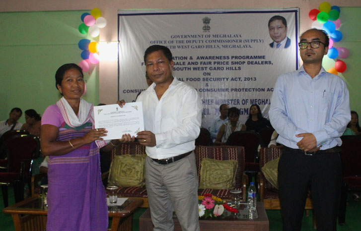 Click to enlarge CM Dr. Mukul Sangma during a felicitation programme for wholesellers and FPS dealers at Ampati on 21-06-2017