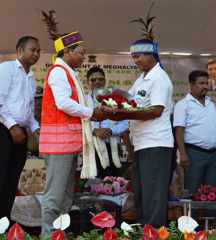 Click to enlarge CM Dr Mukul Sangma felicitates one of the three nokmas who donated land for Raksamgre Civil Sub Division