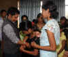  Children from S O S village, Umiam tying Rakhi wristbands to the Meghalaya Chief Minister, Dr Mukul Sangma in his office chamber on 24.8.2010