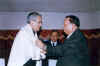 Click to enlarge Meghalaya CM, Dr D D Lapang presenting a shawl to the Governor of Meghalaya, Mr B.L. Joshi at a farewell meeting held in his honour organised by the State Government at Hotel Pinewood