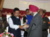  Meghalaya CM, Dr Donkupar Roy presenting a momento to His Excellency the Governor of Meghalaya, Dr S S Sidhu at a farewell meeting held in his honour by the State Government at Hotel Pinewood, Shillong